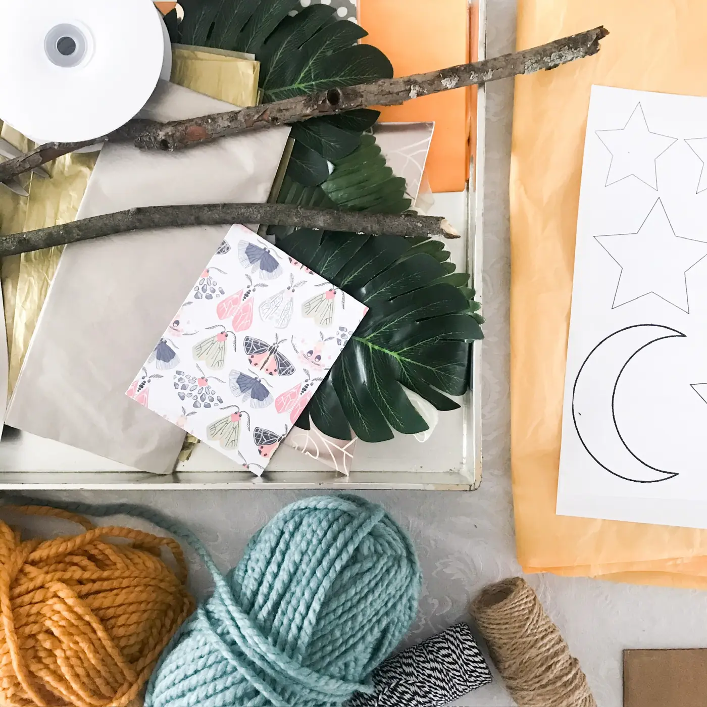 Craft supplies laid out for a Create for a Cause workshop