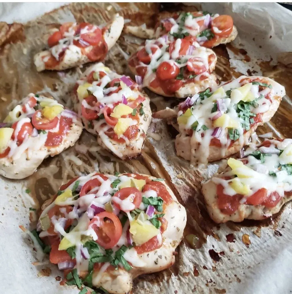 Small homemade pizzas with colourful toppings